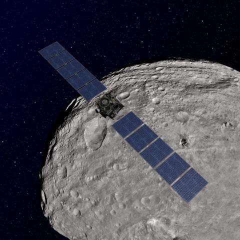 An artist's rendition of the Dawn probe over Vesta. Dawn visited Vesta between 2011 and 2012.