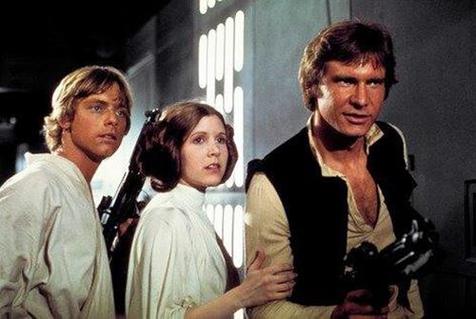 Luke Skywalker (Mark Hamill), Leia Organa (Carrie Fisher), and Han Solo (Harrison Ford) in "Star Wars IV: A New Hope."