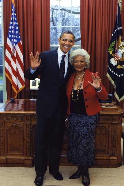 President Obama and Nichelle Nichols flash the Vulcan greeting.