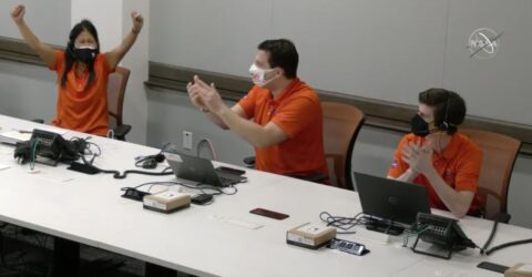 NASA Mars Helicopter Ingenuity project manager MiMi Aung (left) celebrates with her team at the Jet Propulsion Laboratory in California after seeing images from the first successful flight on Mars by the Ingenuity helicopter on April 19, 2021.