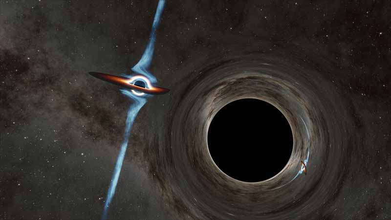 Two Giant Black Holes Spiral Toward Collision