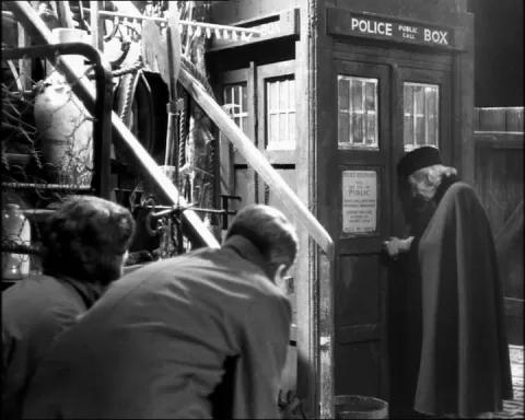 The Unearthly Child - Ian and Barbera, schoolteachers, follow  Susan home but find only an abandoned police box in a junkyard.  Doctor Who, William Hartnell, The Unearthly Child